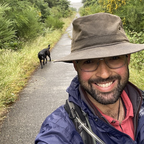 Picture of Phil walking his dog